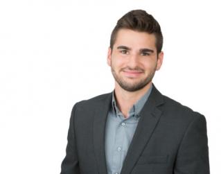 Trevor Davis in a suit jacket portrait