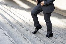 close-up-man-walking-stepping-up--work-business