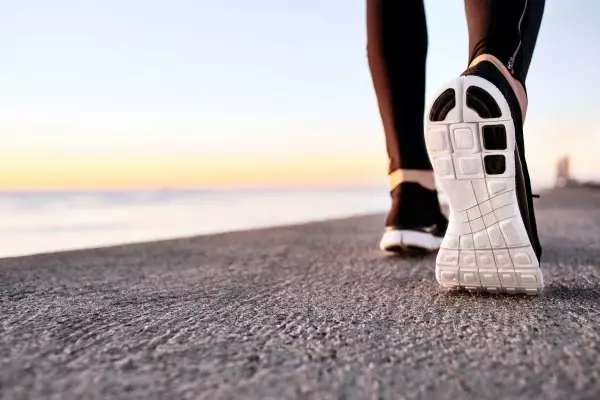 closeup-sport-shoes-concrete-path